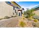 Modern home with a walkway leading to the front door and drought-tolerant landscaping at 1 Easy St # 12, Carefree, AZ 85377