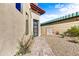 Modern home with brick pathway, drought-resistant landscaping, and a side gate at 1 Easy St # 12, Carefree, AZ 85377