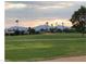 Scenic sunset view overlooking a peaceful golf course at 10161 W Pineaire Dr, Sun City, AZ 85351