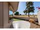 Outdoor patio space with golf course view at 10161 W Pineaire Dr, Sun City, AZ 85351