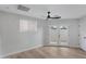 Bright bedroom with french doors opening to a patio at 1104 N Oak Ct, Gilbert, AZ 85233