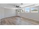 Bedroom with hardwood floors and multiple windows at 1104 N Oak Ct, Gilbert, AZ 85233