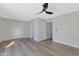 Bright bedroom with hardwood floors and double doors at 1104 N Oak Ct, Gilbert, AZ 85233