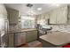 Modern kitchen featuring stainless steel appliances and updated countertops at 1126 S 97Th Way, Mesa, AZ 85208