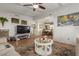 Open concept living area with seating and a view of the dining area at 1126 S 97Th Way, Mesa, AZ 85208