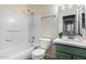 Clean bathroom with a bathtub, toilet and modern vanity at 11670 W Pine Mountain Ct, Surprise, AZ 85378