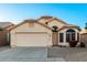 Charming single-story home with a welcoming front porch at 11670 W Pine Mountain Ct, Surprise, AZ 85378