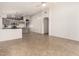 Open kitchen with island, stainless steel appliances, and light cabinets at 11670 W Pine Mountain Ct, Surprise, AZ 85378