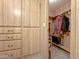 Walk-in closet with ample hanging and shelving space at 120 N Val Vista Dr # 81, Mesa, AZ 85213