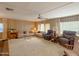 Spacious living room with ample seating and large windows at 120 N Val Vista Dr # 81, Mesa, AZ 85213