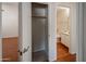 Clean bathroom with toilet, shower, and vanity at 12750 W Dreyfus Dr, El Mirage, AZ 85335