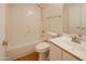 Clean bathroom with tub, toilet and vanity at 12750 W Dreyfus Dr, El Mirage, AZ 85335