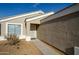 Front entry of house with walkway and security door at 12750 W Dreyfus Dr, El Mirage, AZ 85335