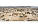 Aerial view of a house on a large lot with surrounding desert landscape at 13705 S 209Th Ave, Buckeye, AZ 85326