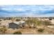 Aerial view of a manufactured home on a spacious lot with desert landscape at 13705 S 209Th Ave, Buckeye, AZ 85326