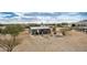 Aerial view of a single-story home on a large lot with desert landscaping at 13705 S 209Th Ave, Buckeye, AZ 85326