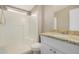 Clean bathroom with a shower/tub combo and granite vanity at 13705 S 209Th Ave, Buckeye, AZ 85326