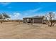 Single story home with desert landscaping and spacious yard at 13705 S 209Th Ave, Buckeye, AZ 85326