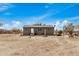 Single story home with desert landscaping and spacious yard at 13705 S 209Th Ave, Buckeye, AZ 85326