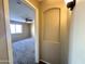 Carpeted bedroom with a ceiling fan and a window at 13943 S Amado Blvd, Arizona City, AZ 85123