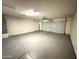 Attached two-car garage with ample space for parking and storage at 13943 S Amado Blvd, Arizona City, AZ 85123