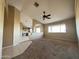 Open living room with a view into the kitchen area at 13943 S Amado Blvd, Arizona City, AZ 85123