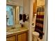 Bathroom with wood vanity and shower/tub combo at 14300 W Bell Rd # 5, Surprise, AZ 85374