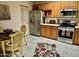 Kitchen with wood cabinets, stainless steel appliances at 14300 W Bell Rd # 5, Surprise, AZ 85374