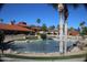 Relaxing pond with fountain in front of community building at 14300 W Bell Rd # 5, Surprise, AZ 85374