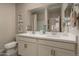 Bathroom with double vanity and toilet at 17066 W Seldon Ln, Waddell, AZ 85355