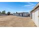 Large backyard with gravel ground, providing ample space at 2046 E Alder Cir, Mesa, AZ 85204