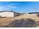 View of the home's backyard, showing large open space at 2046 E Alder Cir, Mesa, AZ 85204