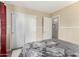 Spacious bedroom with sliding door closet and window at 2135 N St Pedro Ave, Casa Grande, AZ 85122