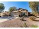 Front view of a single-story house with a two-car garage at 2135 N St Pedro Ave, Casa Grande, AZ 85122