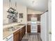 Well-equipped kitchen featuring ample counter space and wood cabinetry at 2135 N St Pedro Ave, Casa Grande, AZ 85122