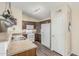 Bright kitchen with stainless steel appliances and wood cabinets at 2135 N St Pedro Ave, Casa Grande, AZ 85122