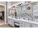 Elegant bathroom boasts dual sinks and a large walk-in shower at 2223 W Hazelhurst Ct, Anthem, AZ 85086