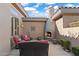 Private courtyard with fireplace and comfortable seating at 2223 W Hazelhurst Ct, Anthem, AZ 85086