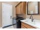 Laundry room with washer, dryer, and a utility sink at 2223 W Hazelhurst Ct, Anthem, AZ 85086