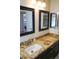 Bathroom featuring granite countertops and double sinks at 2300 W Temple St, Chandler, AZ 85224