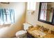 Clean bathroom with shower/tub combo and granite vanity at 2300 W Temple St, Chandler, AZ 85224