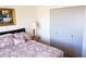 Bright bedroom featuring a double bed and built-in closet at 2300 W Temple St, Chandler, AZ 85224