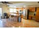 Kitchen with an island, stainless steel appliances, and wood cabinets at 2300 W Temple St, Chandler, AZ 85224