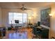 Living room with hardwood floors and home office at 2300 W Temple St, Chandler, AZ 85224