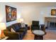 Living room with a fireplace and hardwood floors at 2300 W Temple St, Chandler, AZ 85224