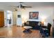 Living room with hardwood floors and a view into the kitchen at 2300 W Temple St, Chandler, AZ 85224