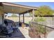 Relaxing covered patio with seating area, perfect for outdoor entertaining at 2300 W Temple St, Chandler, AZ 85224