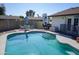 Sparkling pool with patio furniture for lounging at 2300 W Temple St, Chandler, AZ 85224