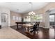 Spacious dining area with hardwood floors and a pool table at 255 W Seagull Pl, Chandler, AZ 85286