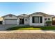 Two-story house with white exterior, landscaped lawn, and a two-car garage at 255 W Seagull Pl, Chandler, AZ 85286